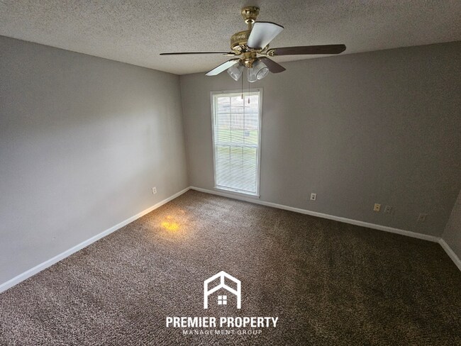 Building Photo - Quiet Cove Living in 38115 | 3BR/2BA with Brick Fireplace & Fenced Yard