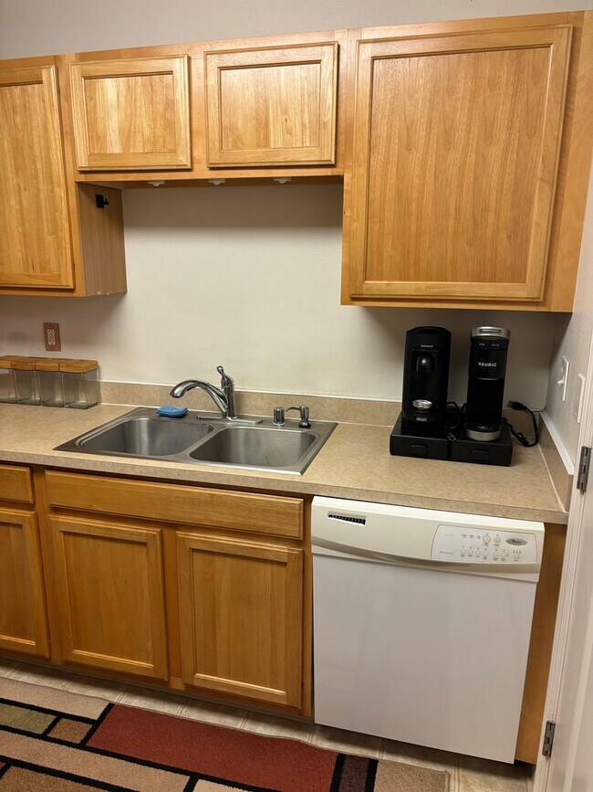 Building Photo - Move-In Ready 2BR/2BA Condo – Fully Furnished, AC, Washer/Dryer, 2 Parking stalls