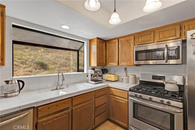 Building Photo - 26120 Alizia Canyon Dr