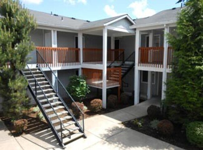 Building Photo - FREE RENT: Contemporary One Bedroom w/New Luxury Vinyl Flooring + Vaulted Ceilings!