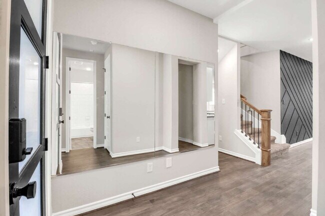 Building Photo - "Spacious 4-Bedroom Sanctuary with Cozy Fireplace in San Antonio's Prime Location!"
