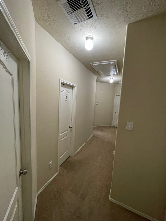 Hallway to the Rooms Split Floor Plan - 1939 Manor Dr