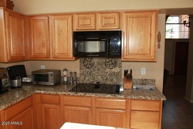 Building Photo - 9113 E Palm Tree Dr
