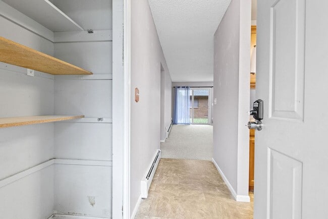 Building Photo - Students Welcome! Spacious 2-Bedroom Condo with Garage and Basement