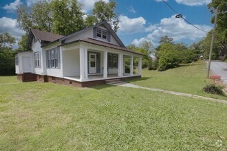 Building Photo - Spacious 4-Bedroom Home with Modern Upgrad...