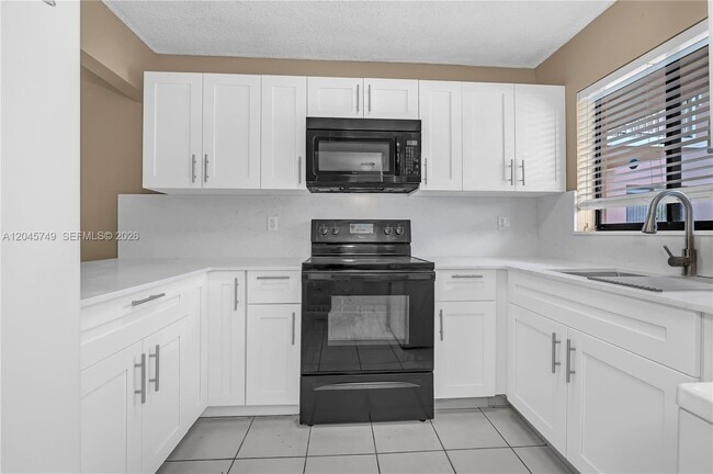 Building Photo - 6041 W 24th Ave