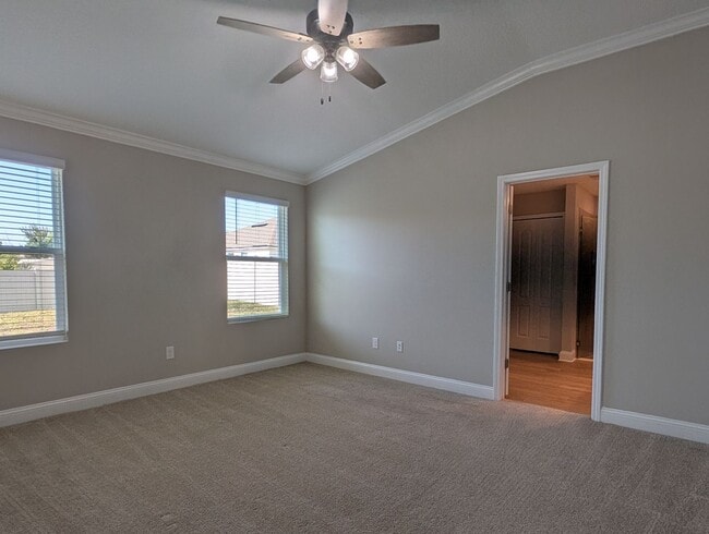 Building Photo - PREMIUM PRICE, PREMIUM FINISHES AND FULLY FENCED REAR YARD - THIS 3/2/2 IN THE DESIRABLE GATED DO...