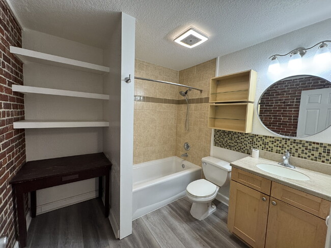 Building Photo - Live in a Piece of History – Unique Condo ...