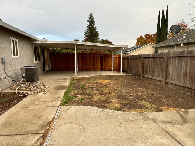 Building Photo - Corner lot with new paint & landscaper