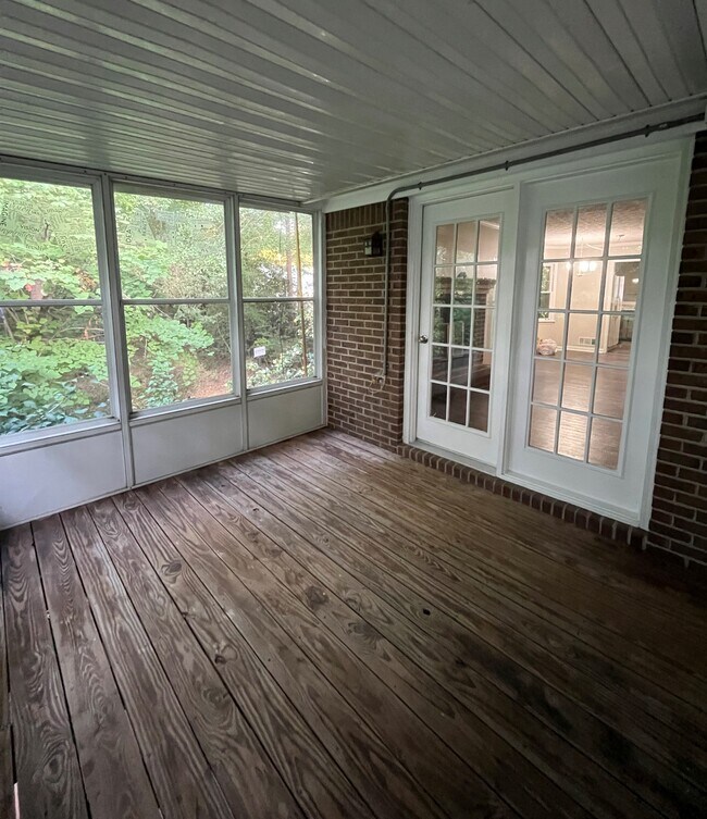 View from lanai into living room - 440 Williamsburg Way