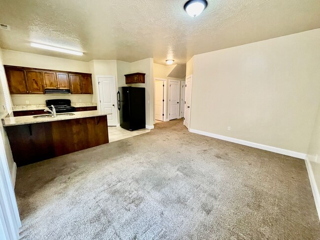 Building Photo - Pet-Friendly Three-Bedroom Townhome with G...