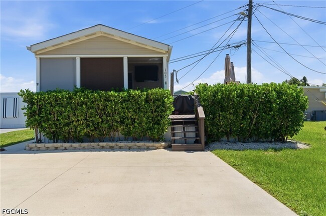 Building Photo - 5558 Palm Beach Blvd