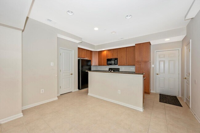 Building Photo - Desirable Two Level Condo For Lease - Not Pet Friendly