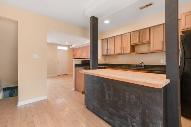 Building Photo - Spacious 2BR/2.5BA Townhome with Finished Basement & Extra Storage