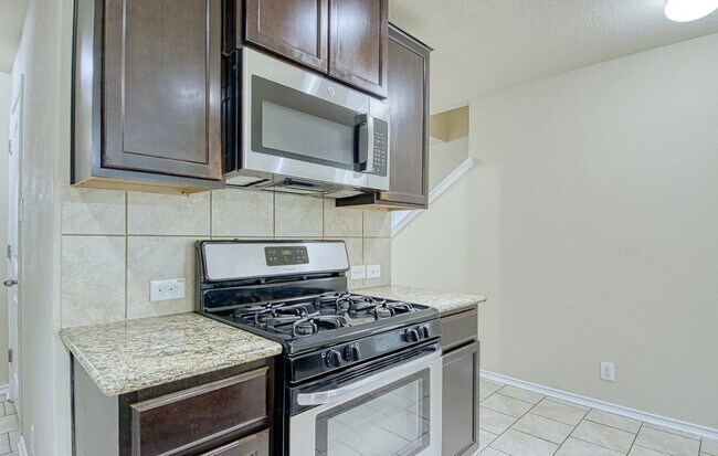gas stove and oven - 10814 Arkey Ave