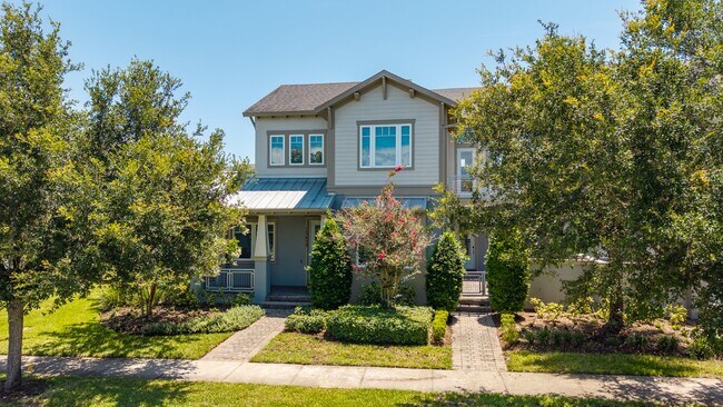Building Photo - Move In Ready End Unit Townhome in Laureate Park | 3 Bed | Tesla Charger
