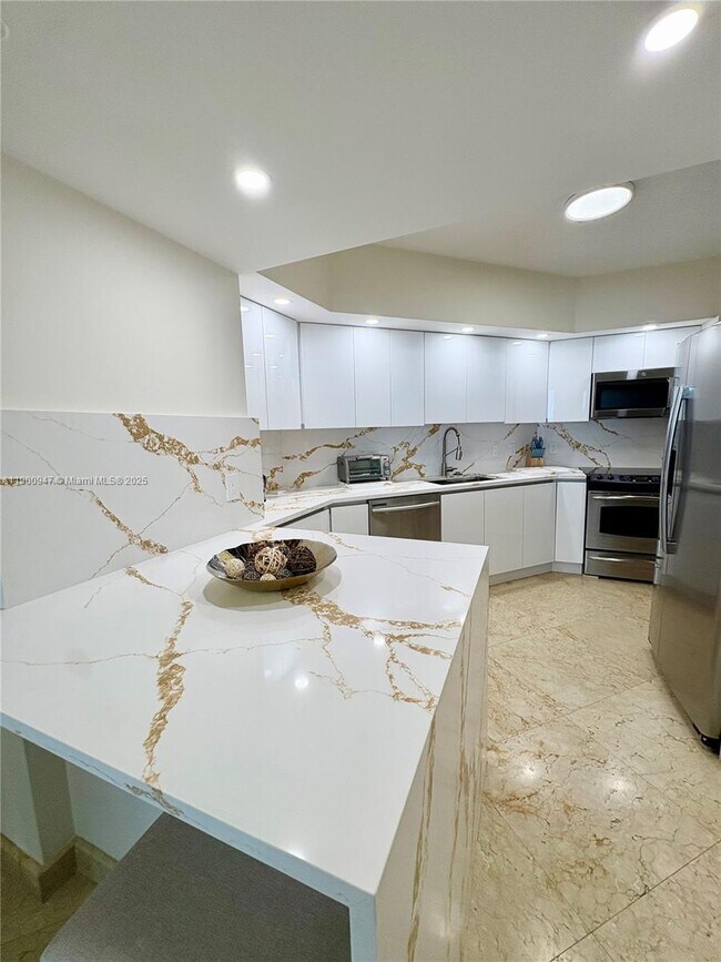 Building Photo - 16699 Collins Ave