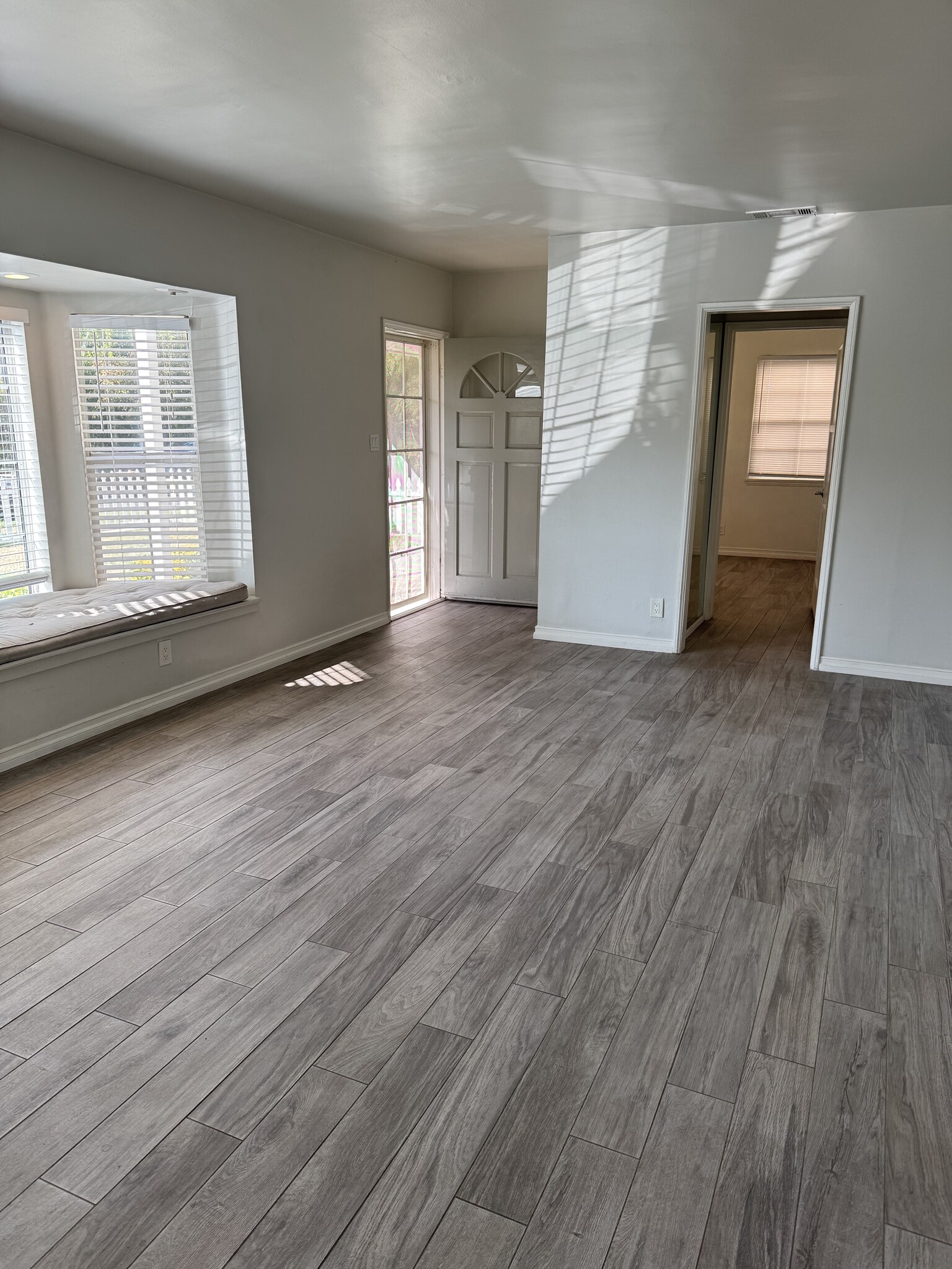 inside living room, front door - 4950 Chimineas Ave