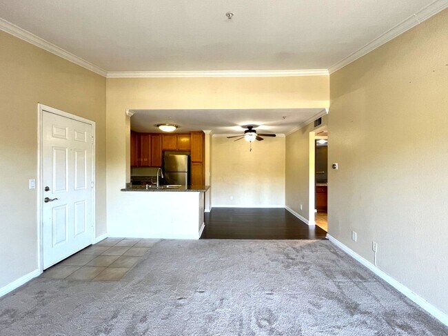 Building Photo - 1BR Condo with Private Balcony, Central A/C & Community Amenities in Corona