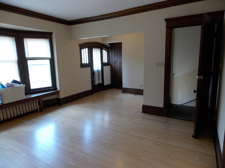 Living Room with extra alcove and private patio - 3408 N Downer Ave