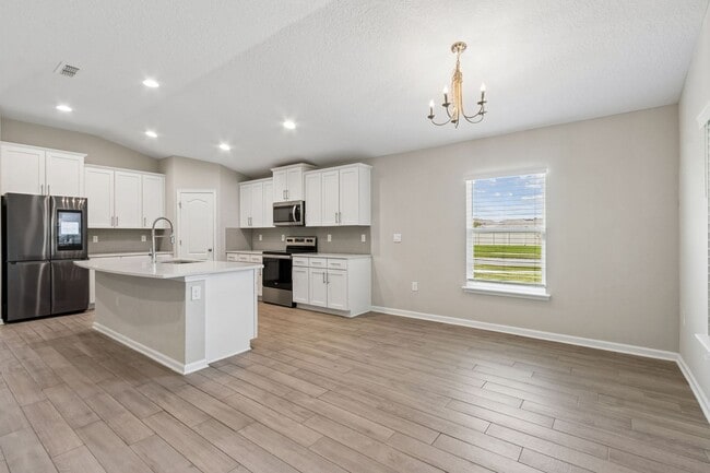 Building Photo - Modern 4BR Home with 3 Full Baths in River Glen | Screened Porch & Resort-Style Amenities