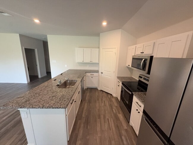Building Photo - Move-in special $150 off first month rent. | A modern 4-bed, 2-bath home