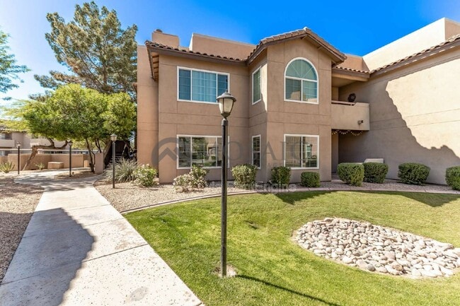 Building Photo - 9451 E Becker Ln