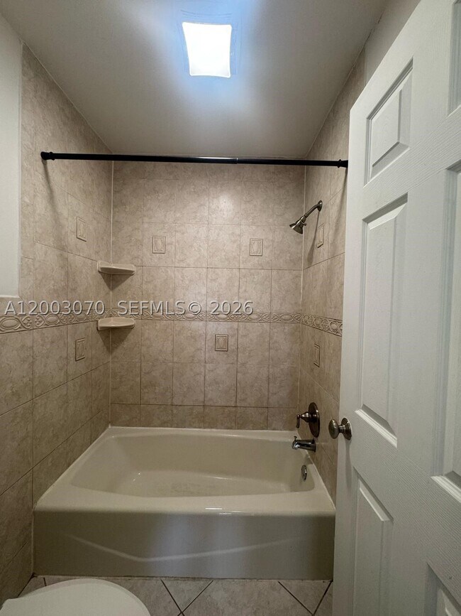 Building Photo - 7410 Woodmont Terrace