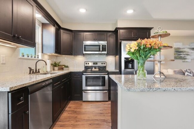Building Photo - Serrano Townhomes with a finished basement...