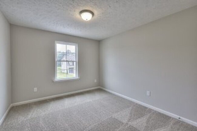 Building Photo - Beautiful NEW 3 Bed 2.5 Bath Townhome in M...