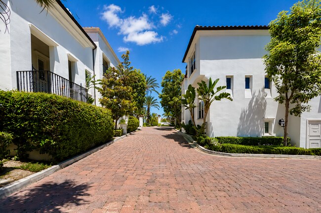 Building Photo - Beautifully Remodel Townhouse with AC & Two Car Garage!