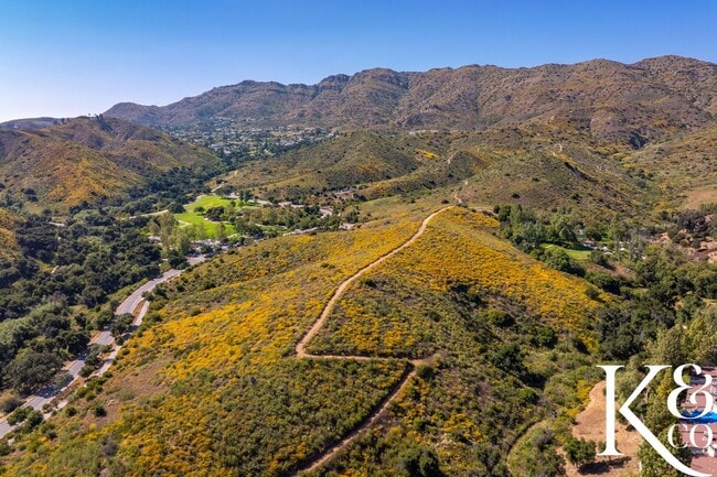 Building Photo - Relaxing Home in Vibrant Community with Pool, Spa, and Courts