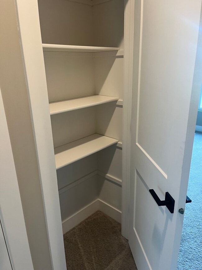 Building Photo - New Construction, 2 bed, 3 bath Row Home, with 2 car garage, fireplace, and rooftop deck!