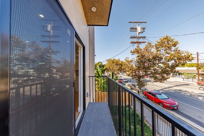 Building Photo - 5931 Woodman Ave