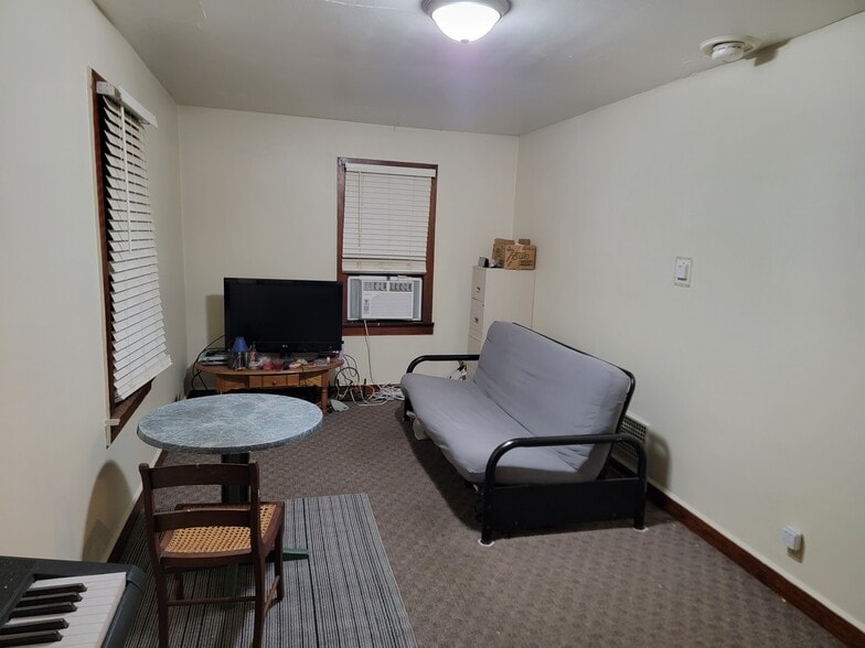 Floor now hardwood as pictured - 1019 E 8th St