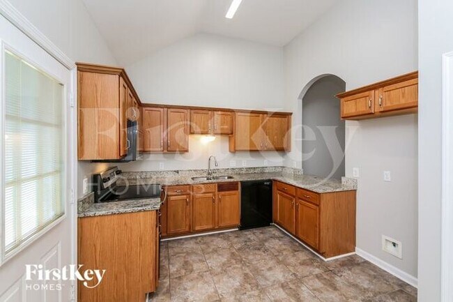 Building Photo - 8595 Shady Elm Dr