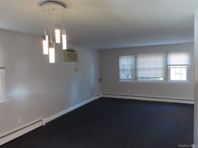 Building Photo - 1210 Smithtown Ave