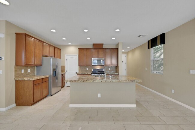 Building Photo - Southern Highlands: Spacious 4-Bedroom Home in a Gated Community with Upstairs Loft, Private Back...