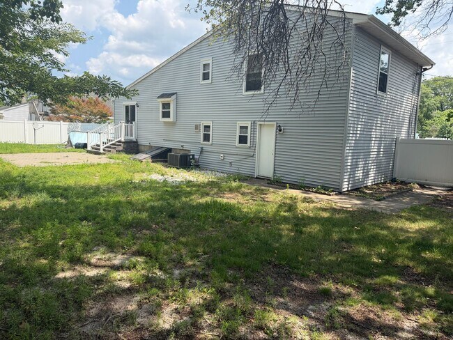 Building Photo - Renovated 3BR Split-Level on a Spacious Corner Lot with Garage in Toms River
