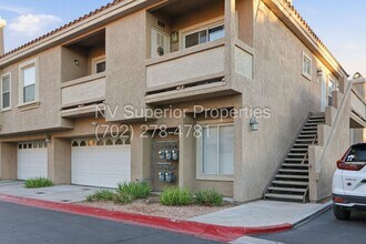 Building Photo - SW!!! 2 Bedroom Condo 1st Floor!! 2 Garage!! Gated!! Community Pool!! Fitness Room!! 2 Primary Be...