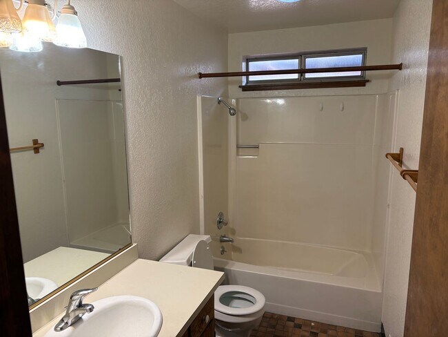 Building Photo - One level cabin with fenced backyard and garage