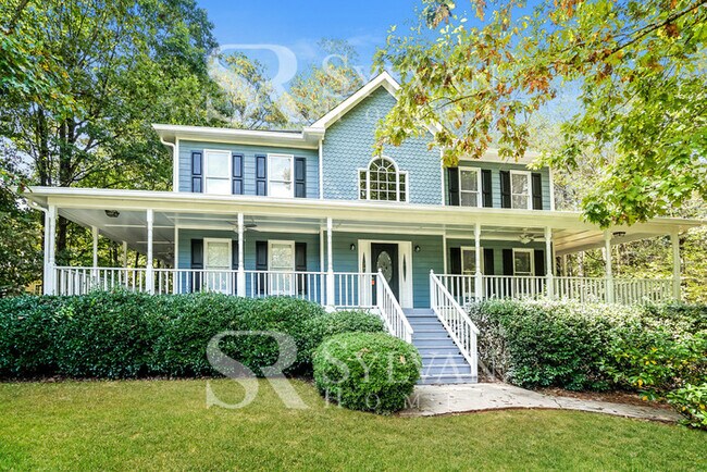 Building Photo - The living is easy in this 4 bedroom, 2.5 ...
