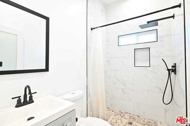 Building Photo - 6961 Balcom Ave