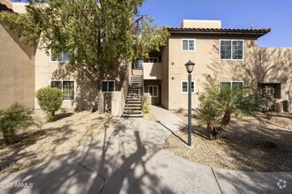 Building Photo - 9450 E Becker Ln