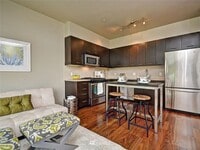 Building Photo - Avail Now: Corner Unit at Ruby in Eastlake – Canal Views, Natural Light & Parking