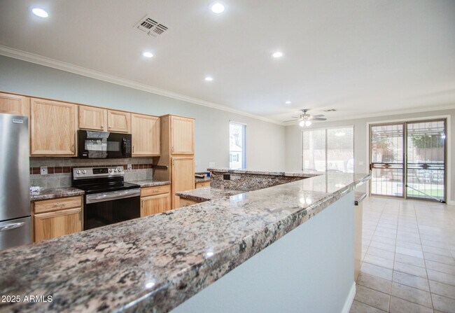 Building Photo - 1634 W Windsong Dr