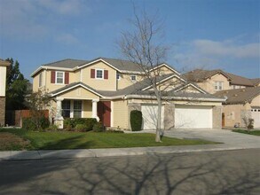 Building Photo - EXTREMELY DESIRABLE TRACY GREEBNRIAR ESTATES WITH SPACIOUS REAR YARD WITH SPA & POOL!