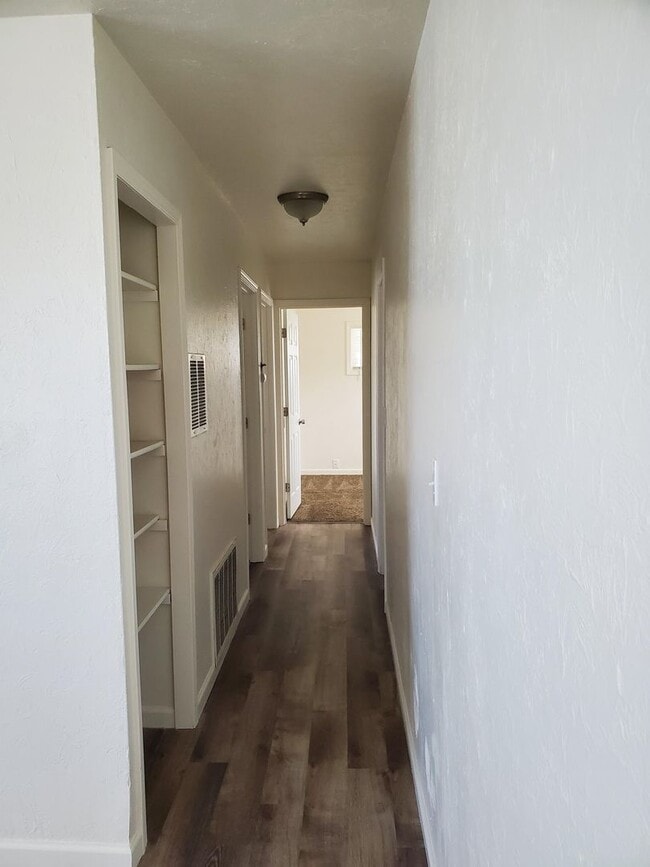 Building Photo - Three bedroom home close to schools and do...