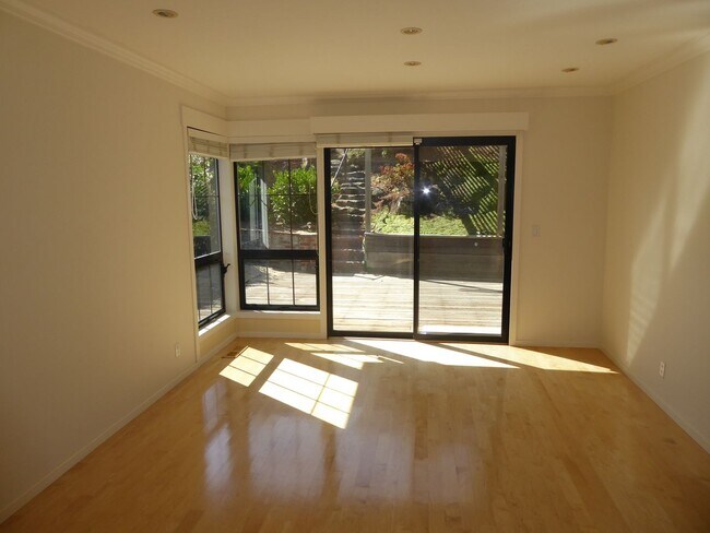Building Photo - SPACIOUS FOUR BEDROOM / THREE AND HALF BAT...