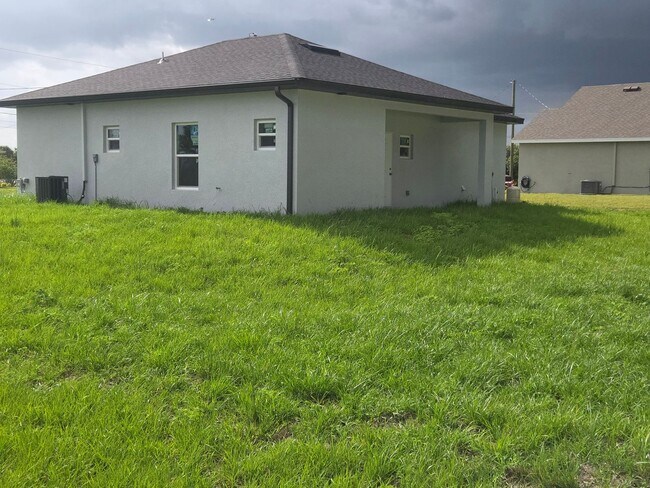 Building Photo - BRAND NEW 2/2/1- SW LEHIGH ACRES